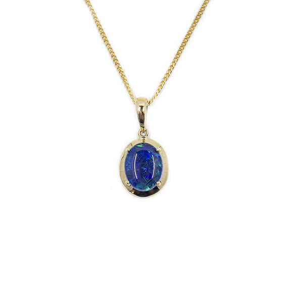 9ct yellow gold triplet opal pendant with hues of green and blue. | Fremantle Opals